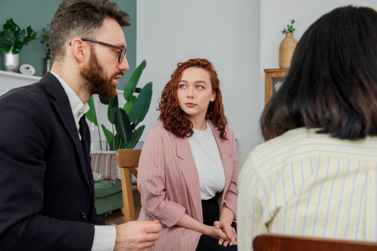 without prejudice family mediation - couple in room with mediator