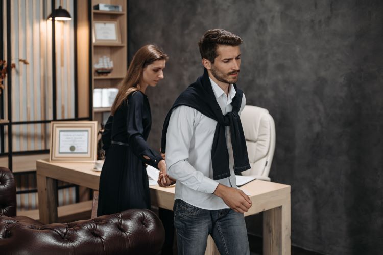 asset division mediation vs court. couple walking out of court room
